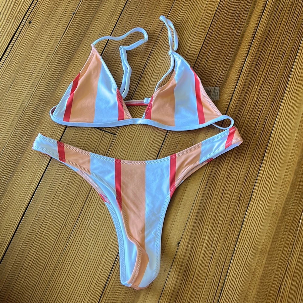 Bright swimwear bikini, never worn, top and bottom size medium.